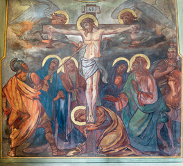 Papier Peint - VIENNA, AUSTIRA - JUNI 24, 2021: The fresco of Crucifixon in the church Marienkirche by Josef Dragan (1905).