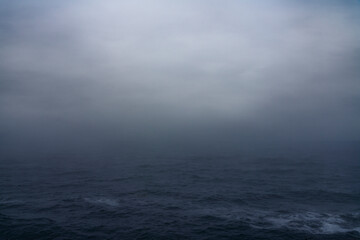 Wall Mural - beautiful seascape, thick fog descended on the water after the storm.