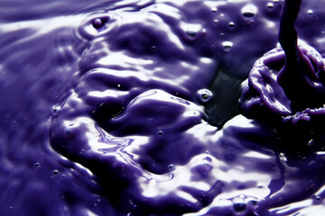 Wall Mural - close up of purple liquid splash