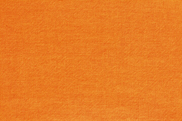 orange cotton fabric cloth texture for background, natural textile pattern.