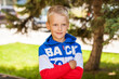 © Andrey_Arkusha - Blonde little boy in a summer park