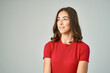 © SHOTPRIME STUDIO - pretty brunette in red t-shirt cropped view smile isolated background