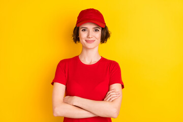 Sticker - Photo of nice optimistic brown hair lady crossed arms wear t-shirt cap isolated on yellow color background