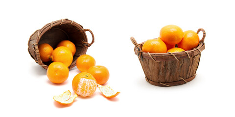 Wall Mural - Mandarin in basket isolated on white