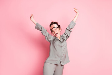 Wall Mural - Photo of young attractive girl wakeup morning yawn stretch wear pajamas isolated over pink color background