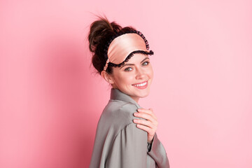 Wall Mural - Profile side view portrait of attractive cheerful girl wearing pajama isolated over pink pastel color background