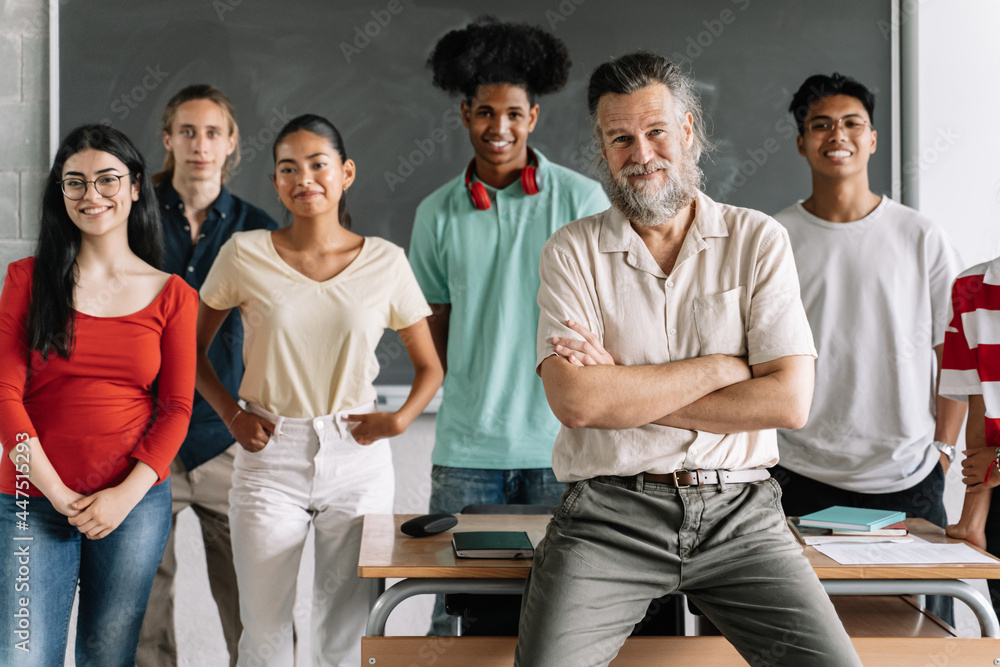 Multi-racial group of teenager secondary school students and friendly ...
