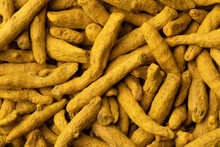 Dried Yellow Turmeric Close Up Full Frame As A Background 