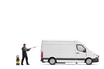 Poster - Full length profile shot of a worker in a uniform cleaning a van with a pressure washer machine