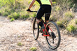 © AntonioDiaz - Rear view of an athlete training on a road bike