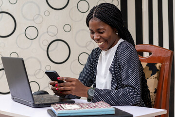 Wall Mural - beautiful accountant using her cellphone to connect to people around.