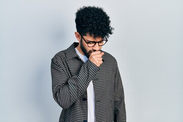 Canvas Print - Young arab man with beard wearing glasses feeling unwell and coughing as symptom for cold or bronchitis. health care concept.