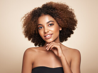 Wall Mural - Beauty portrait of African American girl with afro hair. Beautiful black woman. Cosmetics, makeup and fashion