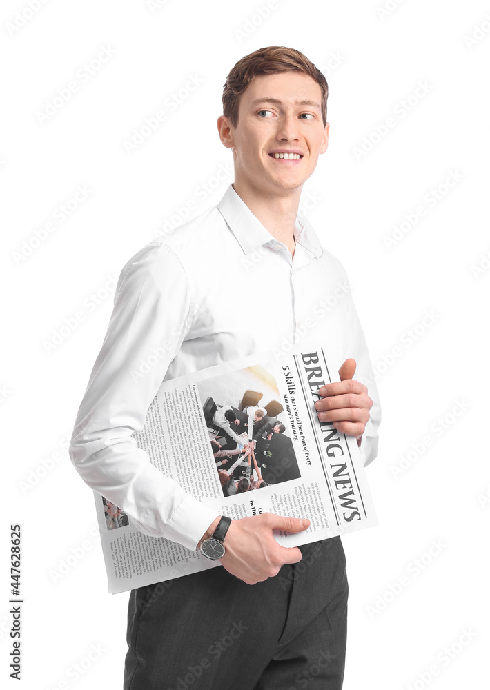 Young businessman with newspaper on white background