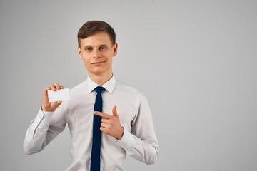 business man in shirt with tie office work business card in hand