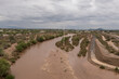 Raging river in Tucson, Arizona after heavy monsoon rain