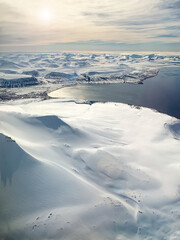 Wall Mural - svalbard snow, mountains and arctic sea, aerial view
