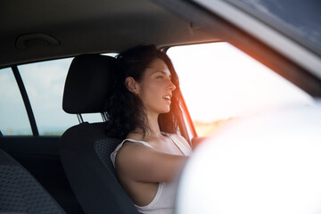 Wall Mural - woman driving car. Happy day. Love girl. Car. Happiness. Life. Travel. Vacation. 