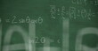 © vectorfusionart - Mathmatical equations written in chalk rising from green chalkboard background 4k