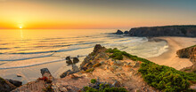 Landscape with sunset over Portuguese West coast and sandy Praia de Odeceixe