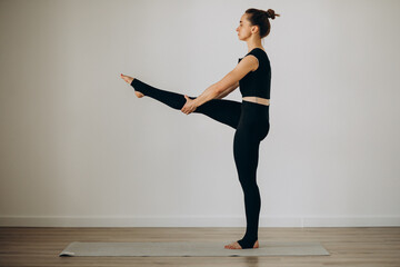 Wall Mural - Woman practice pilates at yoga gym