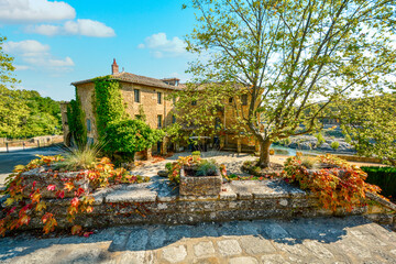 Wall Mural - A typical stone villa or mansion near the Gardon River in the Pont du Gard area of the Provence region in Southern France at autumn.