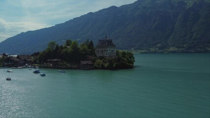 Wall Mural - Seeburg - Former Castle on Lake Brienz in swiss village Iseltwald, Switzerland.  in a Picturesque Small Village in the Brienz Lake - the Swiss Alps - Iseltwald, Switzerland