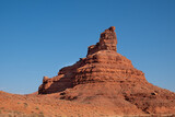 Fototapeta  - Colorful red rock formations contrast against a stark blue sky - Valley of the Gods Utah
