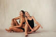 © Jacob Lund - Two women of different ages laughing in a studio
