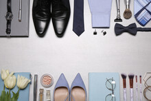 Flat Lay Composition With Fashionable Woman's And Man's Accessories On Light Background. Space For Text