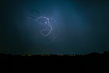Wall Mural - freakishly shaped lightning bolt high in the sky