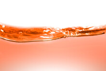 Clean Orange Water With Water Droplets And Waves