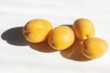 Wall Mural - apricots on a white background