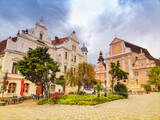Fototapeta Miasto - The main square with old buildings and Parish Church in the charming little town of Frohnleiten in the district of Graz-Umgebung, Styria region, Austria