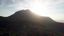 Bright Sunlight From Sunset Behind Hibochiboc Volcano On Camiguin Island