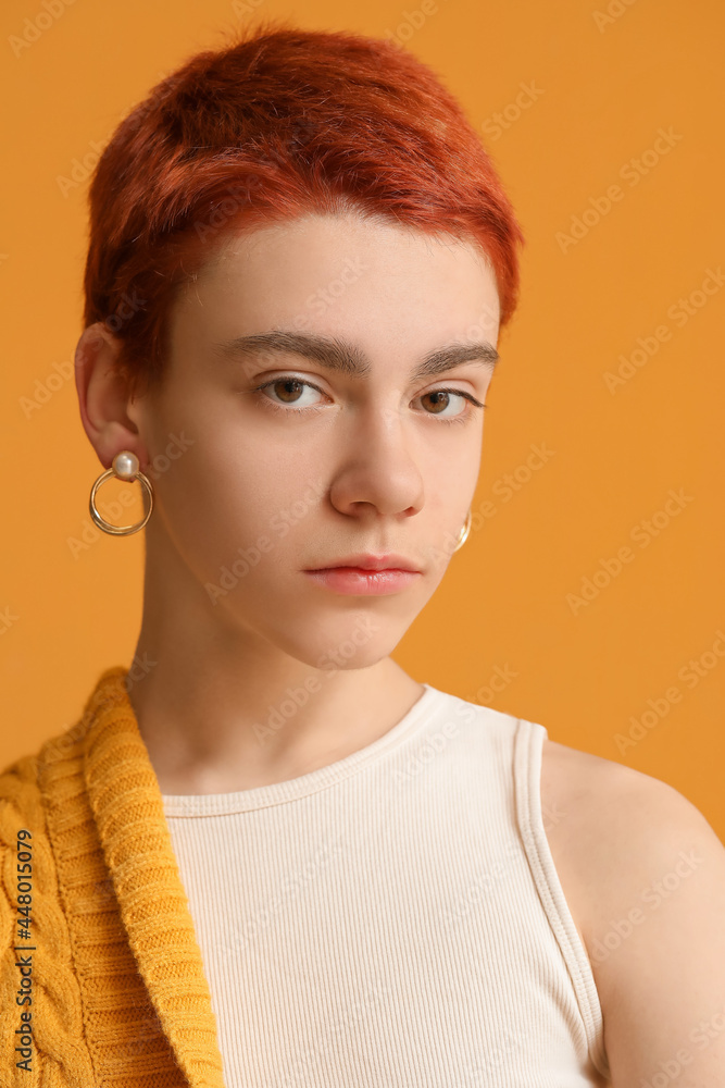 Non-binary teenager on color background