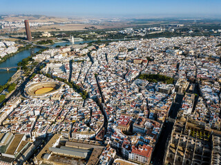 Canvas Print - Aerial view of Seville with the tower, the bullring and the river, Andalusia, Spain