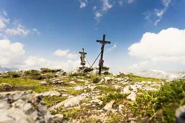 Wall Mural - Mountain summit cross on the top of the alps