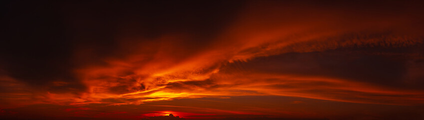 Wall Mural - orange sky clouds at sunset