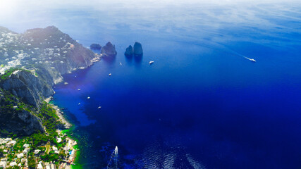 Canvas Print - Faraglioni and Capri coastline from Mt Solaro, drone viewpoint.