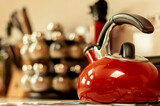Fototapeta Łazienka - Red kettle in a kitchen