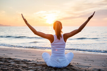 Wall Mural - Beautiful woman doing yoga by the sea