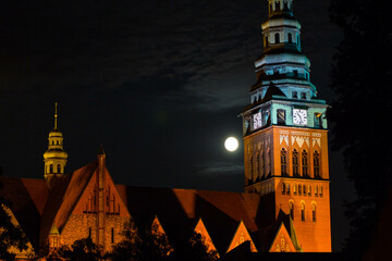 A beautiful church and the moon. Beautiful architecture. Night scene. Background.