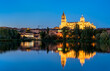 Salamanca Cathedral reflecting in the Tormes river in Spain