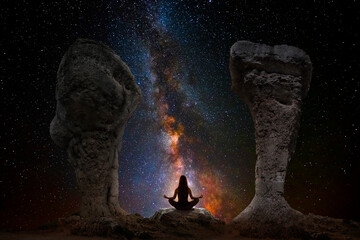 Wall Mural - woman meditating with yoga between dolmens
