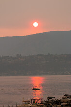 Smoky Sunset Over The Lake, Forest Fires Effect, Smoke, Haze Hanging In The Air Over The Lake