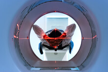 Patient Entering An MRI Machine To Produce A Detailed And Internal Image Of Their Organs To Diagnose The Possible Cause Of Their Illness Or Discomfort