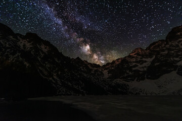 Wall Mural - bright starry sky with the milky way on the background of high tatras mountains