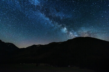 Wall Mural - bright starry sky with the milky way on the background of high tatras mountains
