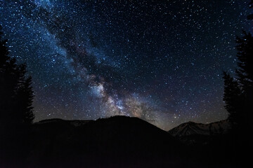 Wall Mural - bright starry sky with the milky way on the background of high tatras mountains